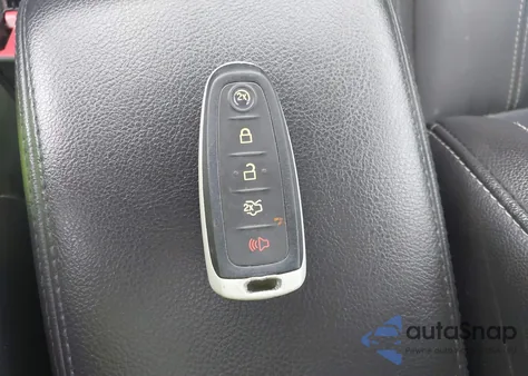 2014 Ford Focus Titanium из США, поврежденный, VIN 1FADP3N2XEL378900